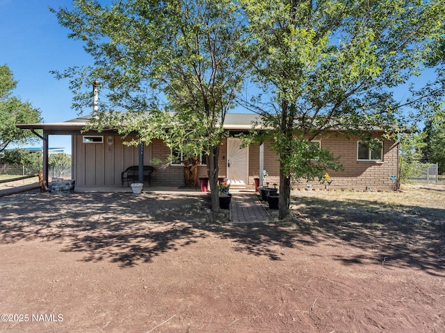 7776 Moonbeam Dr, Flagstaff, AZ 86004 - view of front of house featuring board and batten siding