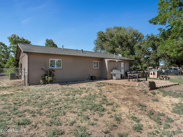 7776 Moonbeam Dr, Flagstaff, AZ 86004 - rear view of house featuring a patio area and a shed