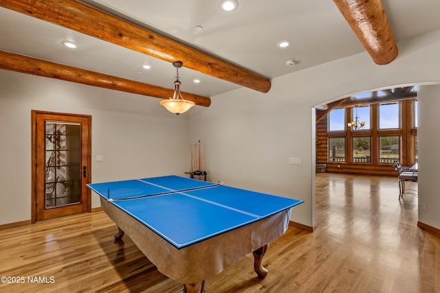 4536 Brackin Ranch Rd, Flagstaff, AZ 86001 - rec room with recessed lighting, beamed ceiling, light wood finished floors, arched walkways, and baseboards