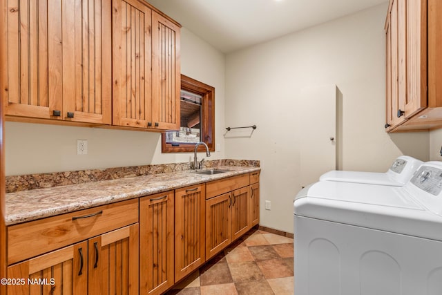 4536 Brackin Ranch Rd, Flagstaff, AZ 86001 - washroom with cabinet space, washer and clothes dryer, and baseboards