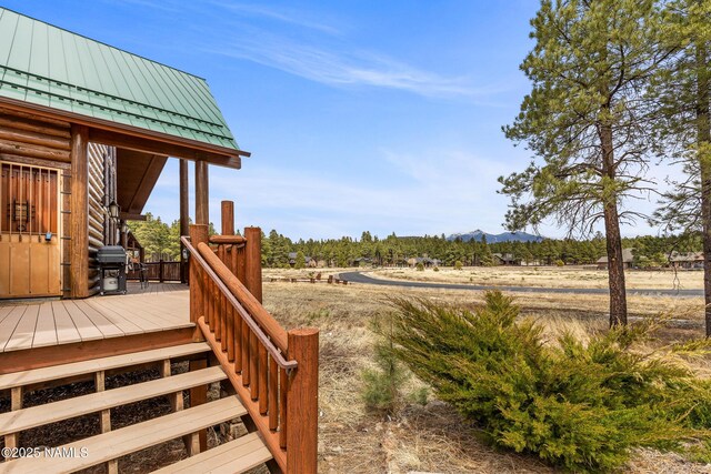 4536 Brackin Ranch Rd, Flagstaff, AZ 86001 - wooden terrace featuring a mountain view and grilling area