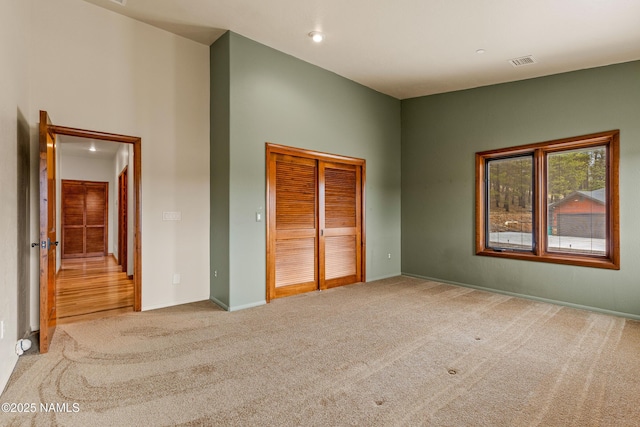 4536 Brackin Ranch Rd, Flagstaff, AZ 86001 - unfurnished bedroom with carpet, baseboards, a closet, and recessed lighting