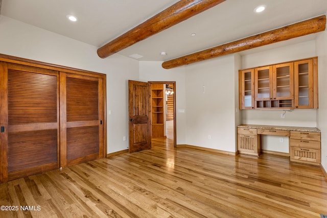 4536 Brackin Ranch Rd, Flagstaff, AZ 86001 - unfurnished dining area with beamed ceiling, light wood-style flooring, recessed lighting, and baseboards