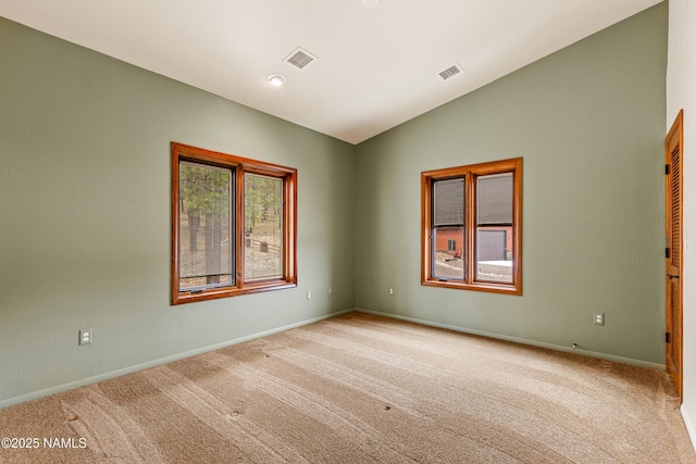 4536 Brackin Ranch Rd, Flagstaff, AZ 86001 - unfurnished room featuring carpet, baseboards, and vaulted ceiling