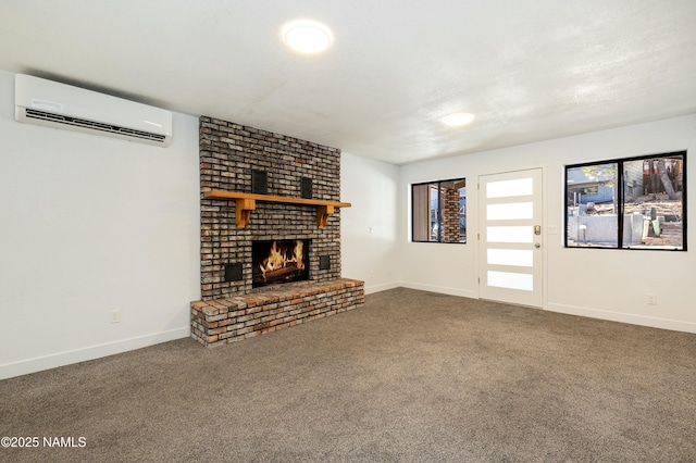 unfurnished living room with carpet flooring, a wall mounted AC, and a brick fireplace