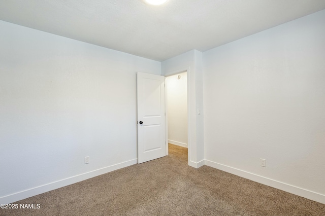 empty room featuring carpet