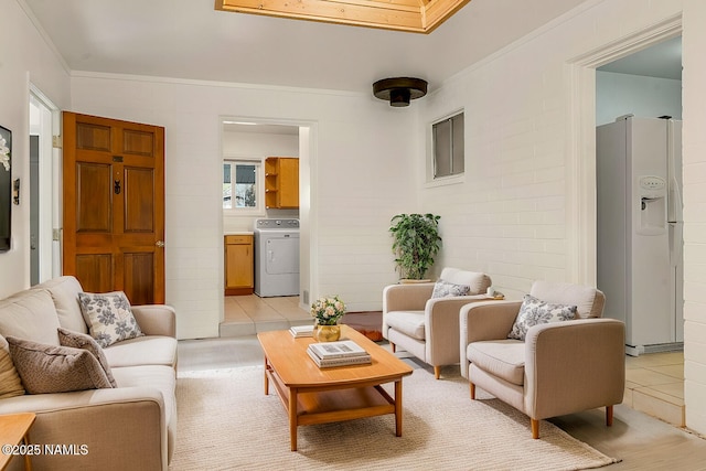 1907 N Meadow Lark Dr, Flagstaff, AZ 86001 - living area featuring crown molding, washer / clothes dryer, and light tile patterned floors