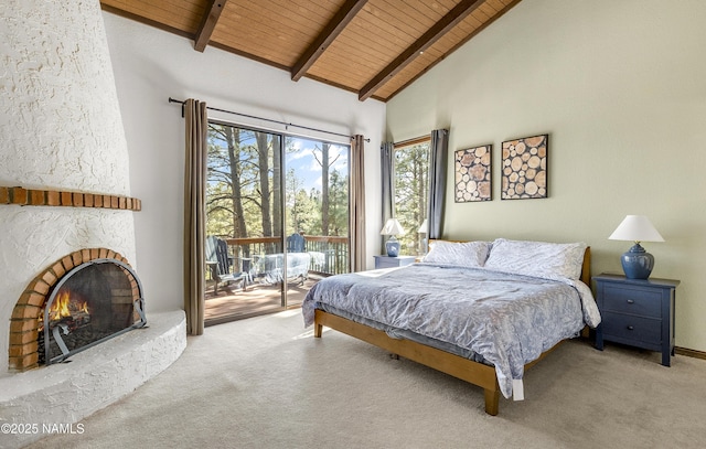 bedroom with light colored carpet, wood ceiling, access to outside, a lit fireplace, and beam ceiling