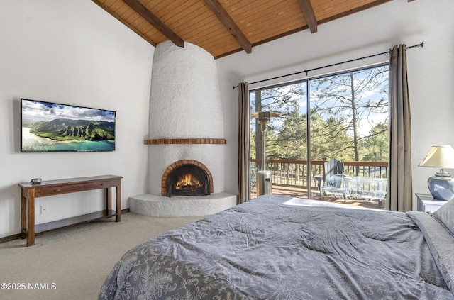 bedroom featuring a large fireplace, wooden ceiling, access to exterior, carpet floors, and beam ceiling