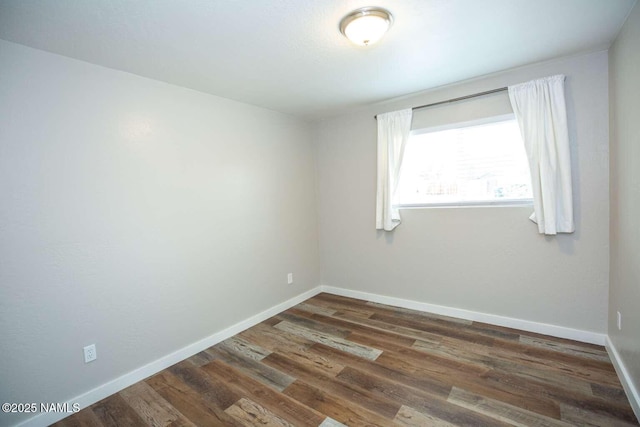 73 Seneca Dr, Flagstaff, AZ 86005 - empty room with baseboards and wood finished floors