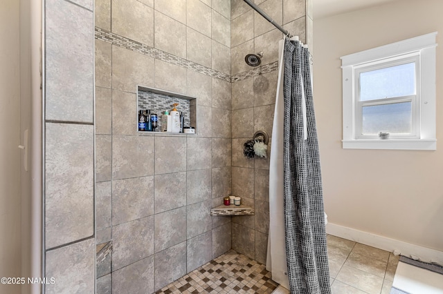 bathroom featuring tile patterned flooring and a shower with shower curtain