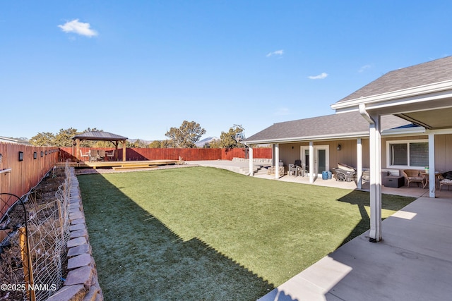 view of yard with a gazebo and a patio area