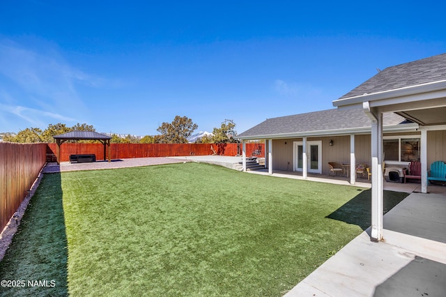 view of yard with a gazebo and a patio area