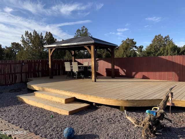 wooden terrace with a gazebo