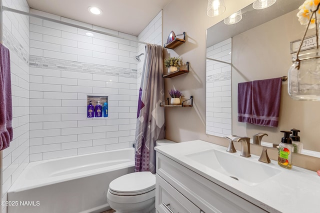 full bathroom featuring vanity, toilet, and shower / bath combo with shower curtain