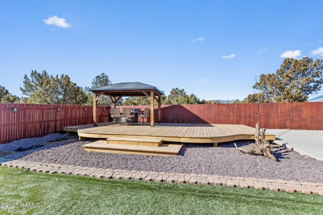 view of yard featuring a gazebo and a wooden deck