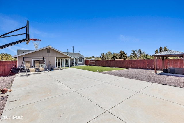 exterior space with a yard, a gazebo, and a patio area