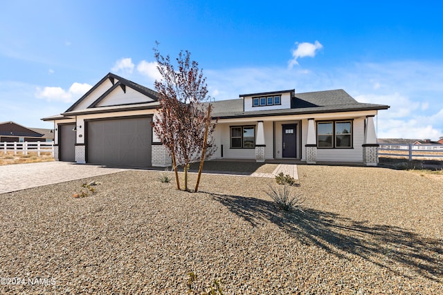 view of front of home featuring a garage