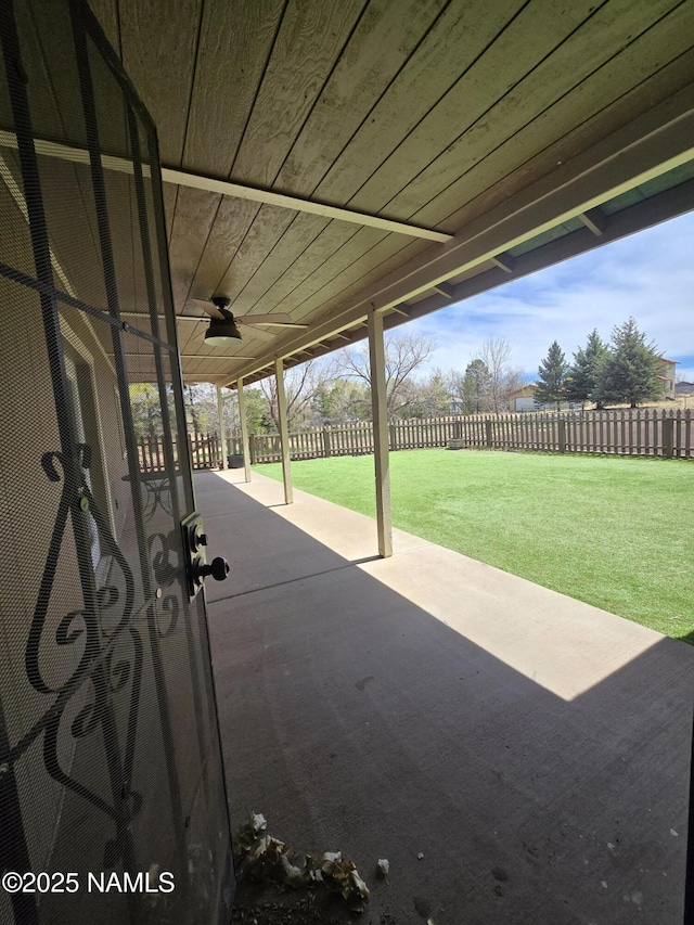 5895 Timberline Trl, Flagstaff, AZ 86004 - view of patio featuring a fenced backyard and a ceiling fan