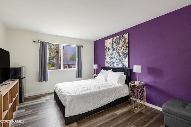 6160 N Dodge Ave, Flagstaff, AZ 86004 - bedroom with wood finished floors and baseboards