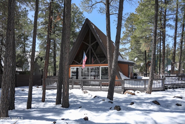 view of front facade featuring a wooden deck