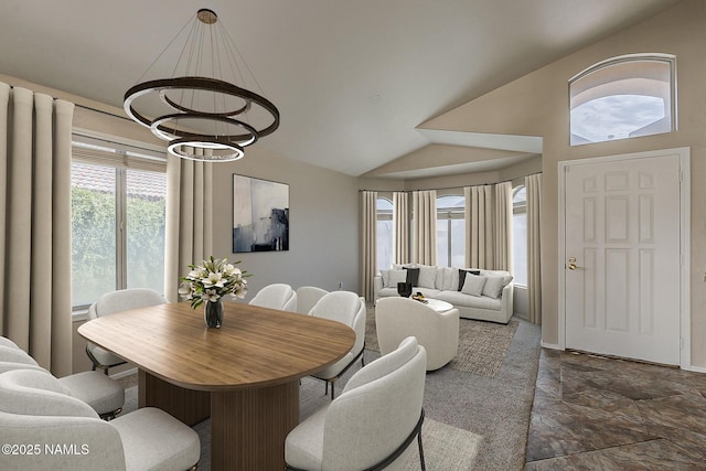 18525 N 85th Ave, Peoria, AZ 85382 - dining area featuring a chandelier, lofted ceiling, and stone finish flooring
