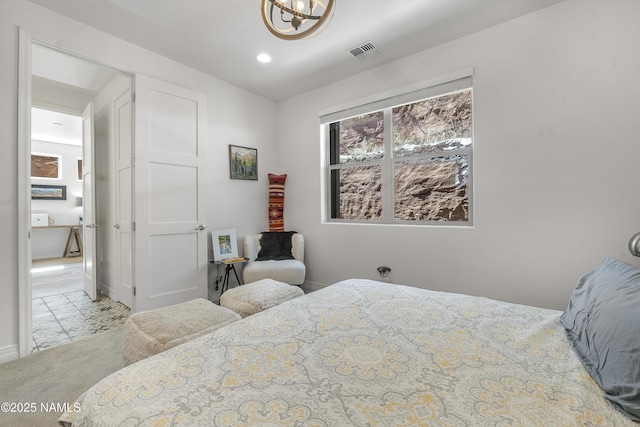 bedroom with an inviting chandelier, recessed lighting, carpet, and visible vents