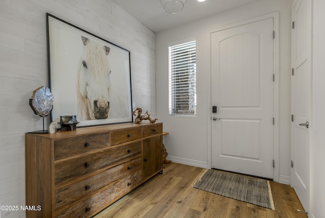 foyer featuring light wood-style flooring