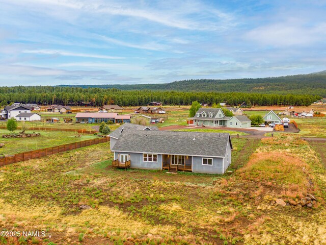 7497 W Dreamview Trl, Flagstaff, AZ 86001 - aerial view of property and surrounding area featuring a heavily wooded area