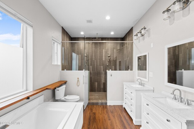 7497 W Dreamview Trl, Flagstaff, AZ 86001 - full bath with a shower stall, two vanities, healthy amount of natural light, recessed lighting, and toilet