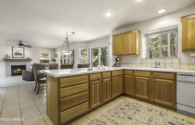 2545 N Broken Circle Rd, Flagstaff, AZ 86004 - kitchen featuring dishwasher, a sink, a ceiling fan, light tile patterned floors, and recessed lighting