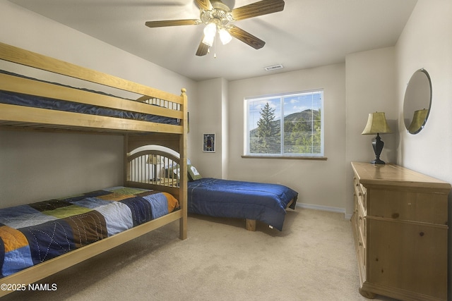 2545 N Broken Circle Rd, Flagstaff, AZ 86004 - bedroom with carpet floors, baseboards, and a ceiling fan