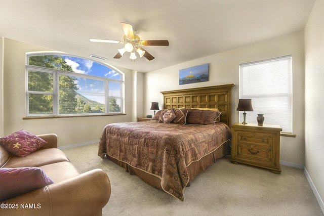 2545 N Broken Circle Rd, Flagstaff, AZ 86004 - bedroom featuring baseboards, light colored carpet, and multiple windows