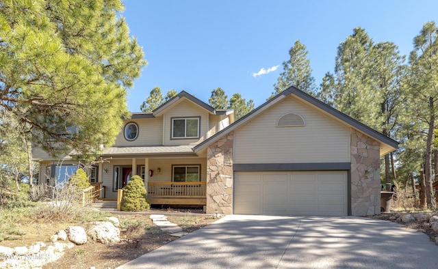 2545 N Broken Circle Rd, Flagstaff, AZ 86004 - traditional home with covered porch, stone siding, driveway, and a garage