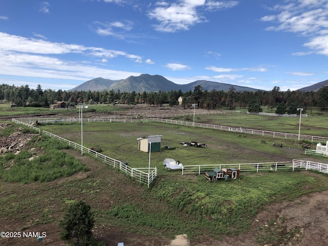 mountain view featuring a rural view