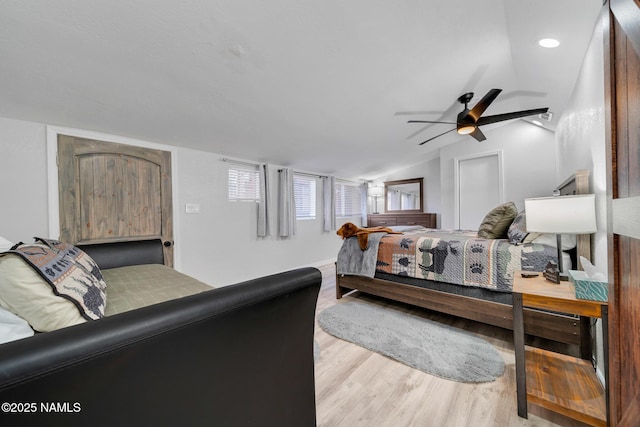 425 W Rte 66, Williams, AZ 86046 - bedroom featuring ceiling fan, lofted ceiling, and light wood-type flooring