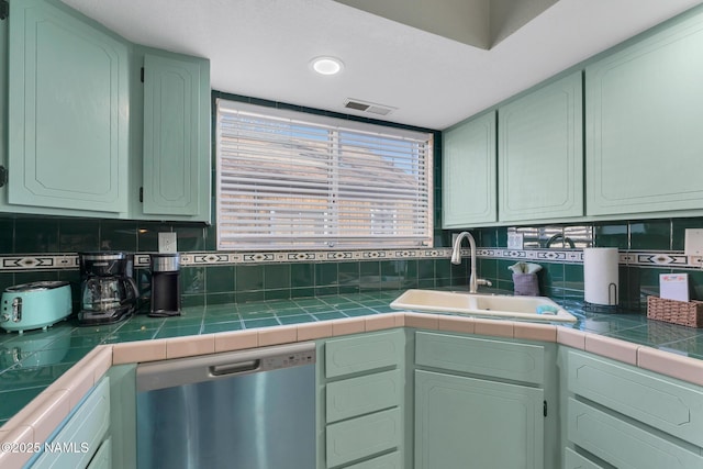 425 W Rte 66, Williams, AZ 86046 - kitchen with tile countertops, stainless steel dishwasher, and green cabinets
