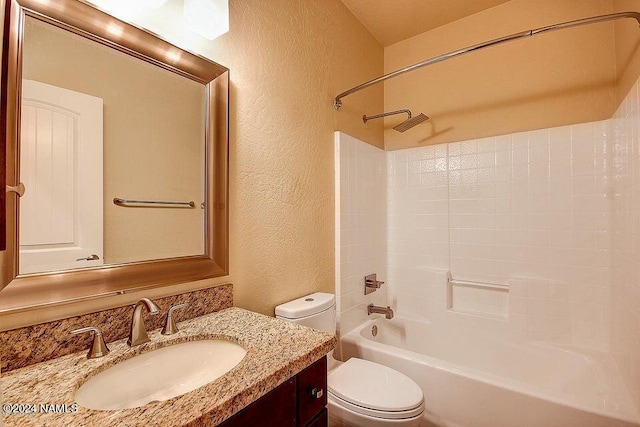 full bathroom with toilet, washtub / shower combination, and vanity