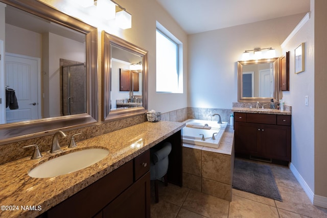 bathroom with vanity, tile patterned floors, and separate shower and tub