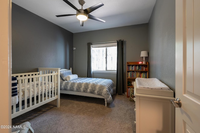 carpeted bedroom with ceiling fan