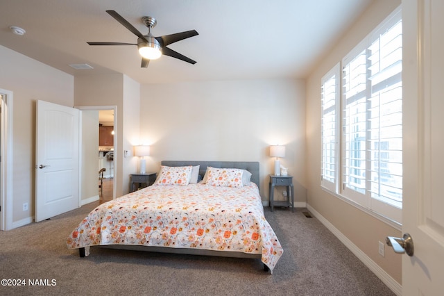 bedroom featuring ceiling fan and carpet flooring