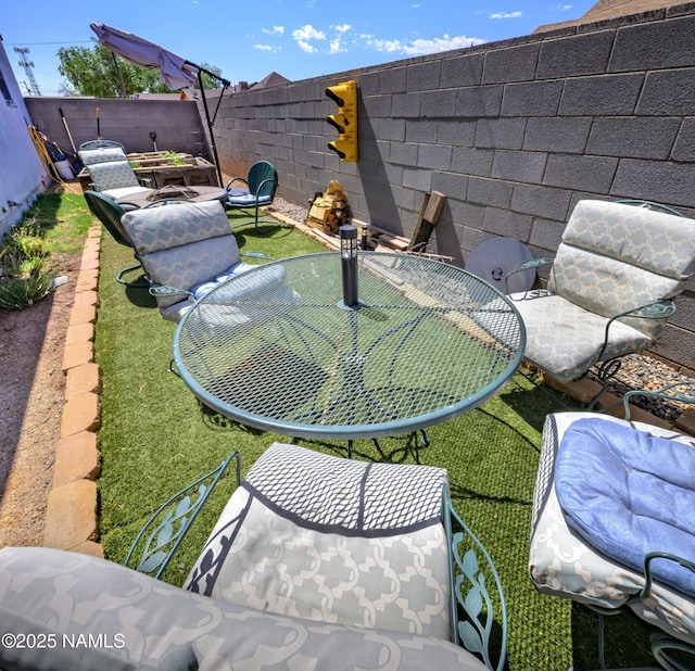 311 N Winslow Ave, Winslow, AZ 86047 - fenced backyard with outdoor dining space