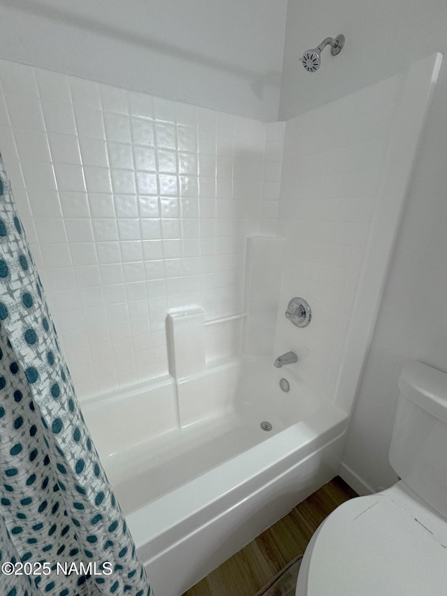1807 N Main St, Flagstaff, AZ 86004 - bathroom with toilet, wood finished floors, and shower / bath combination with curtain