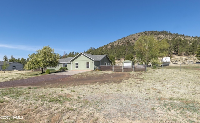 9654 Heritage Dr, Flagstaff, AZ 86004 - view of home's exterior with a mountain view