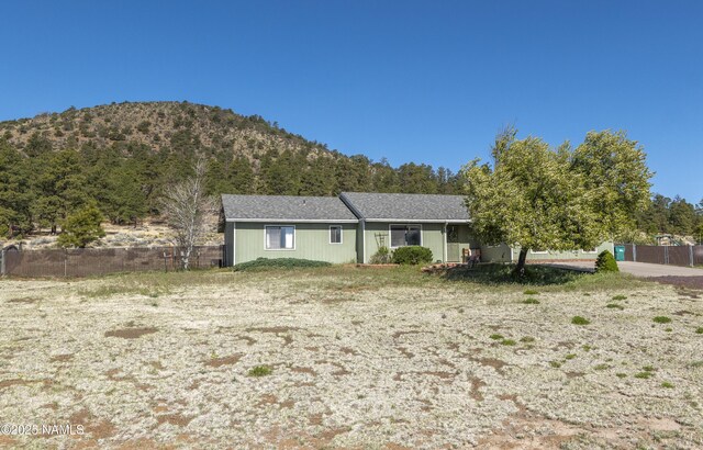 9654 Heritage Dr, Flagstaff, AZ 86004 - view of front of property with a mountain view