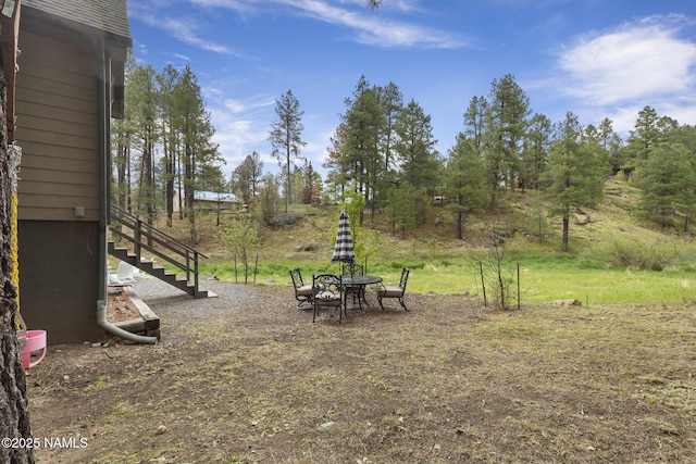 3135 Ancient Trl, Flagstaff, AZ 86005 - view of yard featuring stairway and a fire pit