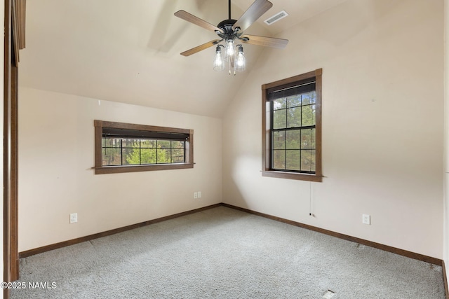 3135 Ancient Trl, Flagstaff, AZ 86005 - additional living space featuring carpet flooring, plenty of natural light, vaulted ceiling, a ceiling fan, and baseboards