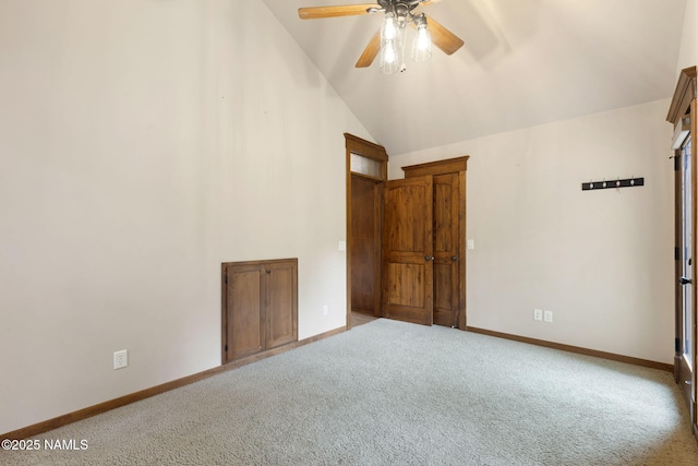 3135 Ancient Trl, Flagstaff, AZ 86005 - carpeted spare room featuring a ceiling fan, baseboards, and high vaulted ceiling