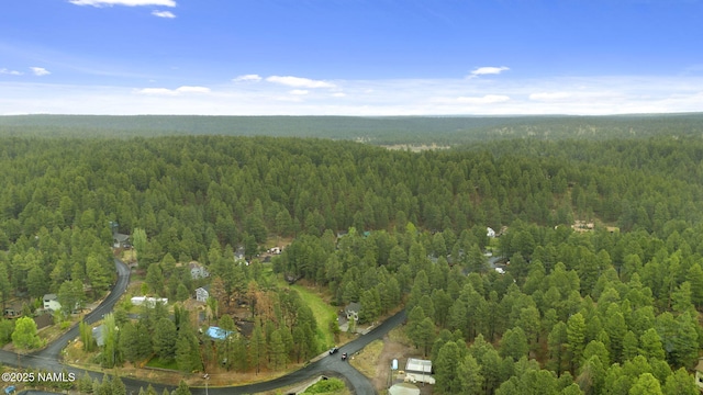 3135 Ancient Trl, Flagstaff, AZ 86005 - aerial overview of property's location featuring a heavily wooded area