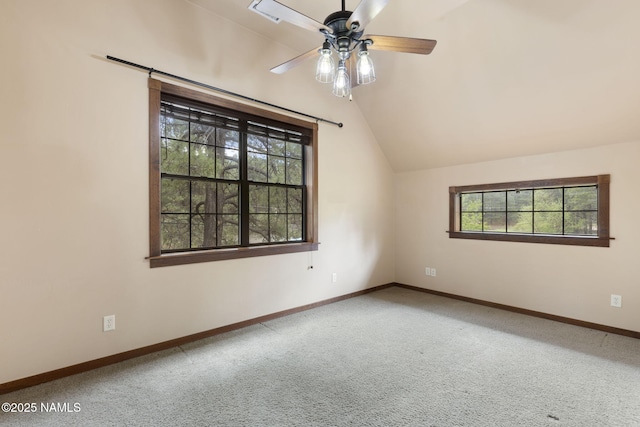 3135 Ancient Trl, Flagstaff, AZ 86005 - unfurnished room with carpet, lofted ceiling, a ceiling fan, and baseboards